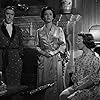 Leo G. Carroll, Patricia Hitchcock, and Ruth Roman in Strangers on a Train (1951)