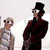 Johnny Depp, Adam Godley, and Jordan Fry in Charlie and the Chocolate Factory (2005)