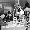 Ace Cain, Bill Cody, Earle Hodgins, Stuart James, and Roger Williams in The Texas Rambler (1935)