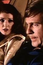 Gil Gerard and Morgan Brittany in Buck Rogers in the 25th Century (1979)