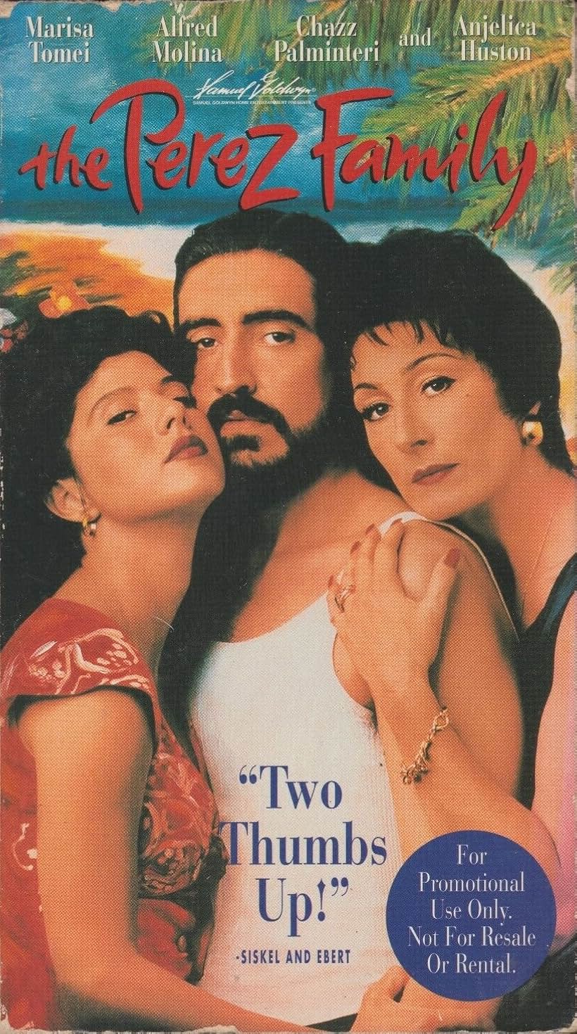 Alfred Molina, Marisa Tomei, and Anjelica Huston in The Perez Family (1995)