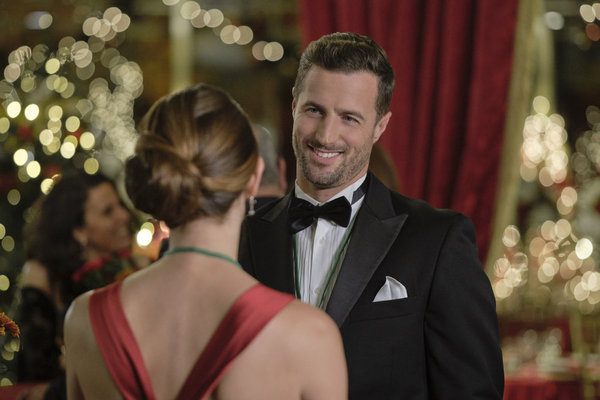 Brendan Penny and Ashley Greene in A Little Christmas Charm (2020)