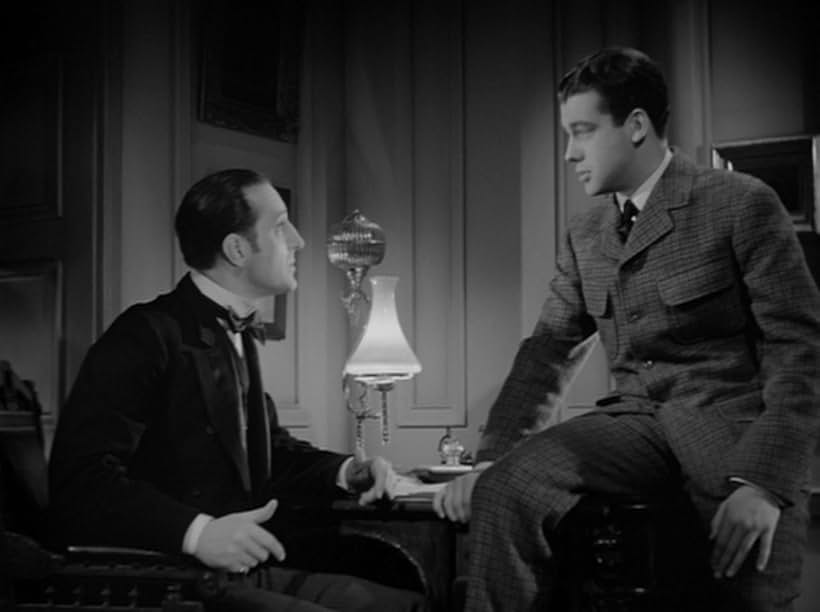 Basil Rathbone and Richard Greene in The Hound of the Baskervilles (1939)