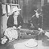 Roy Rogers, Jack O'Shea, and Bradley Page in Sons of the Pioneers (1942)