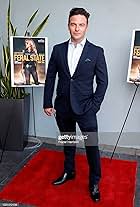 Jon Carlo at the premiere of Feral State