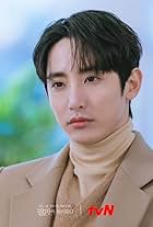 Lee Soo-hyuk in Doom at Your Service (2021)