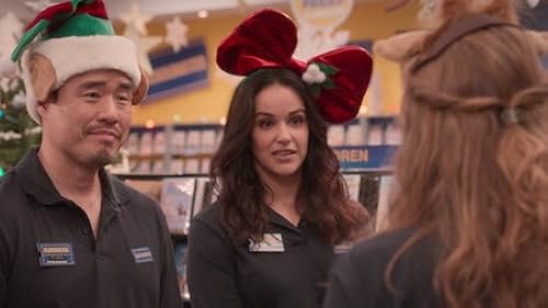 Melissa Fumero and Randall Park in Sh*t Storm (2022)