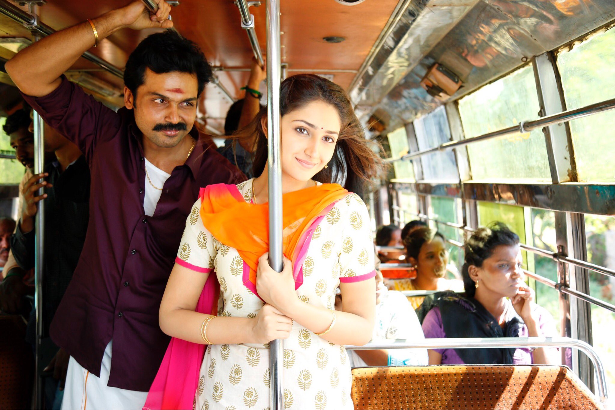 Karthi and Sayyeshaa Saigal in Kadaikutty Singam (2018)