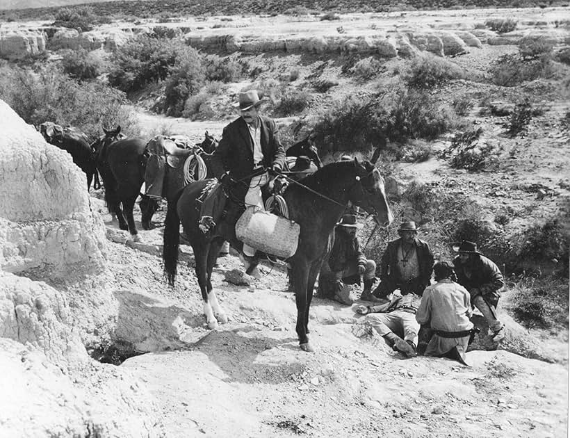 Strother Martin, L.Q. Jones, and Robert Ryan in The Wild Bunch (1969)