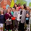 Pik Sen Lim, Mia McKenna-Bruce, Philip Graham Scott, Kia Pegg, Miles Butler-Hughton, Reece Buttery, Kasey McKellar, Sarah Rayson, Akuc Bol, Annabelle Davis, Gwen Currant, Nelly Currant, and Ruben Reuter in The Dumping Ground (2013)