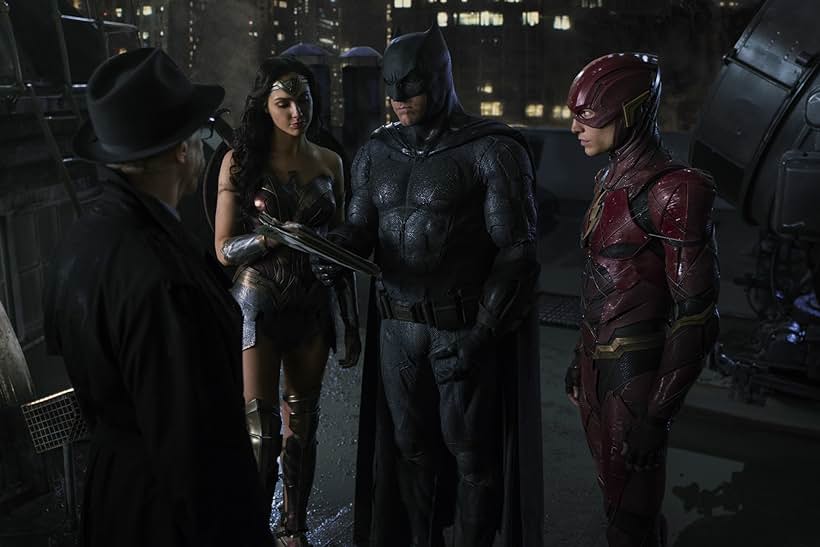 Ben Affleck, J.K. Simmons, Gal Gadot, and Ezra Miller in Justice League (2017)