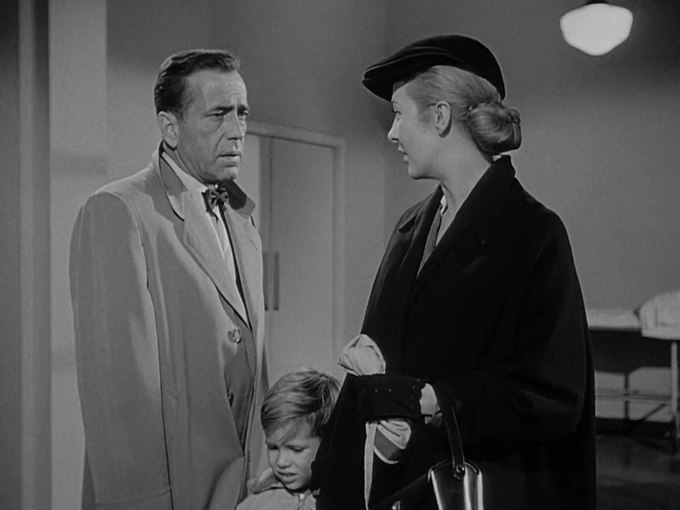 Humphrey Bogart and Irene Vernon in Deadline - U.S.A. (1952)