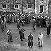 Leo Bieber, Arthur Butcher, Ian Carmichael, Anton Diffring, Bryan Forbes, Lionel Jeffries, John Mills, Rudolph Offenbach, Eric Portman, Keith Pyott, Christopher Rhodes, Denis Shaw, Frederick Valk, and Richard Wattis in The Colditz Story (1955)