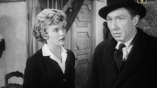 Leigh Madison and Kevin Stoney in Interpol Calling (1959)