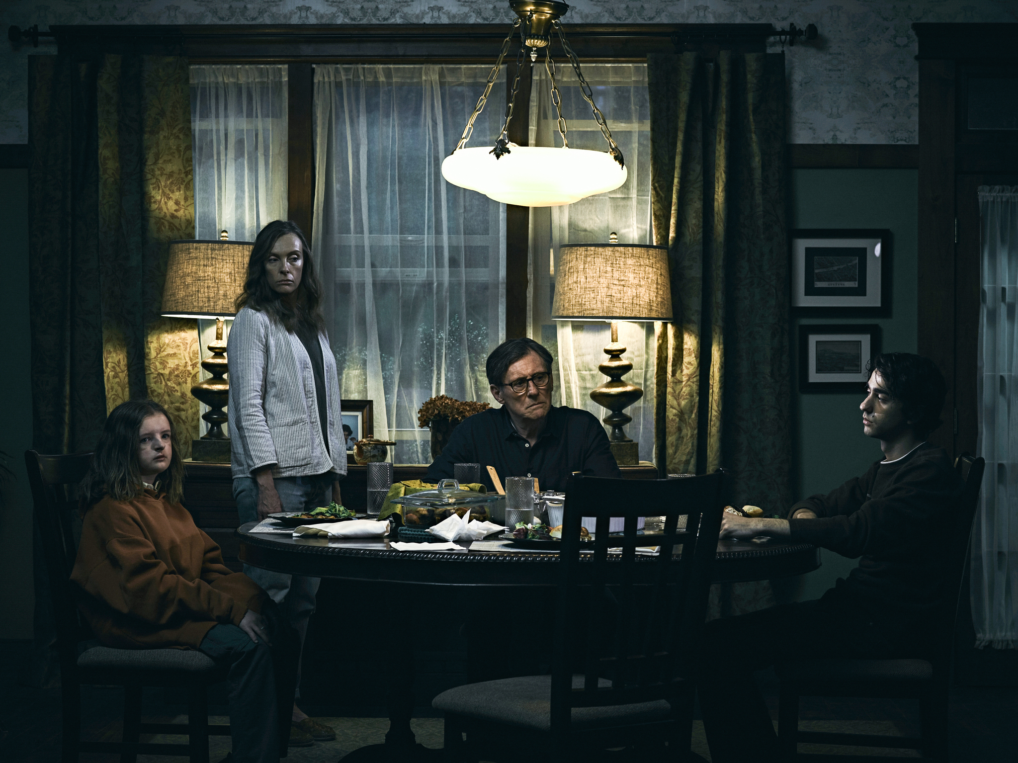 Gabriel Byrne, Toni Collette, Alex Wolff, and Milly Shapiro in Hereditary (2018)