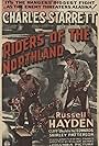 Russell Hayden and Charles Starrett in Riders of the Northland (1942)