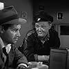 Pat Gleason and Tom Neal in Detour (1945)