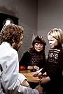 Esa Pakarinen Jr., Pirkko-Liisa Tikka, and Kyösti Väntänen in Villahousupakko (1977)