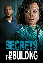 John J. Jordan and Shemeka Wright in Secrets in the Building (2022)