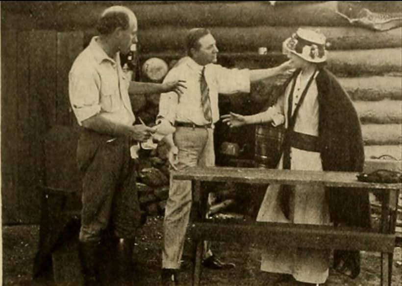 Cecil B. DeMille, Max Figman, and Lolita Robertson in What's His Name (1914)