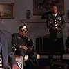 Pierce Brosnan, Martin Short, Rod Steiger, Brian Haley, and Paul Winfield in Mars Attacks! (1996)