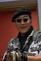 Ben Lam in High Risk (1995)