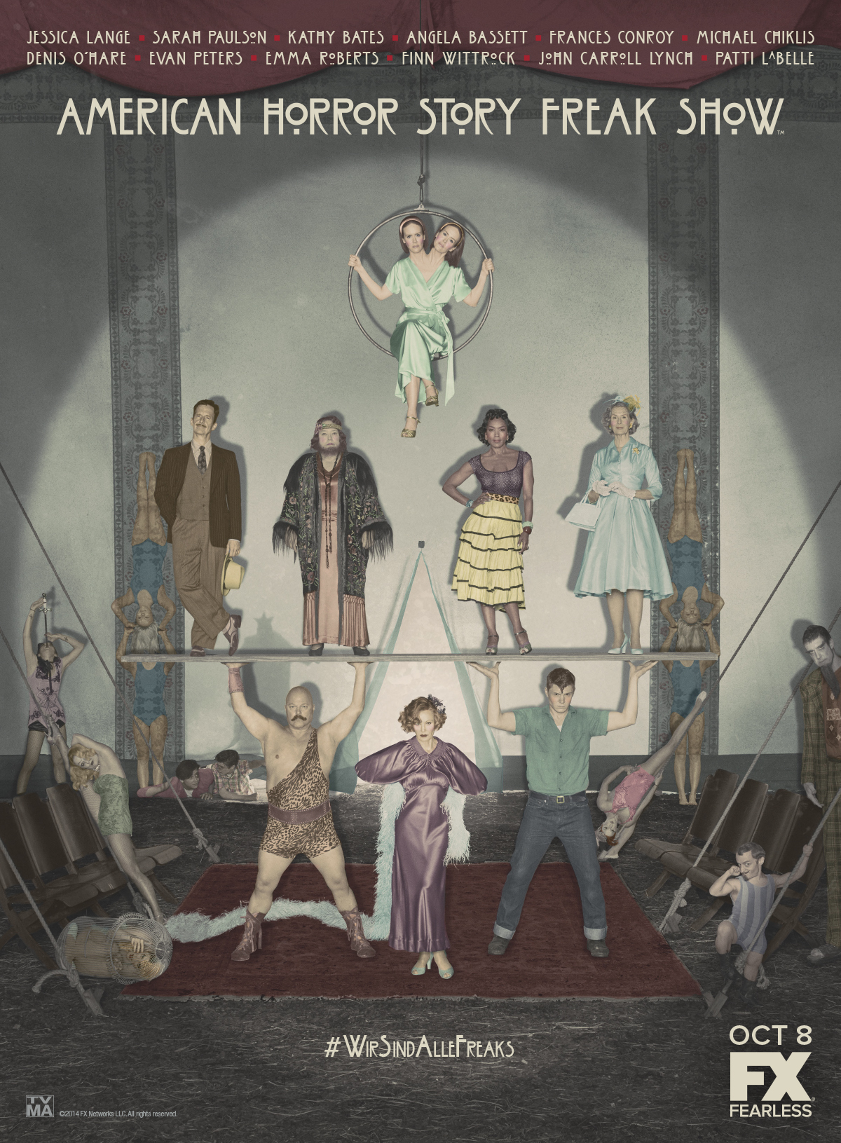 Angela Bassett, Kathy Bates, Jessica Lange, Michael Chiklis, Sarah Paulson, Denis O'Hare, Emma Roberts, Naomi Grossman, Evan Peters, and Finn Wittrock in American Horror Story (2011)