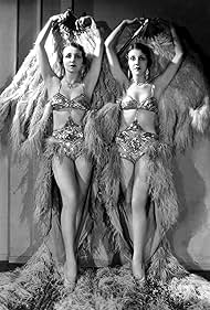 Beth Dodge and Betty Dodge in The March of Time (1930)