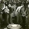 Noah Beery Jr., Lloyd Bridges, John Emery, Osa Massen, and Hugh O'Brian in Rocketship X-M (1950)