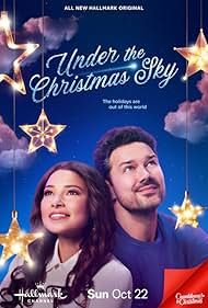 Jessica Parker Kennedy and Ryan Paevey in Under the Christmas Sky (2023)