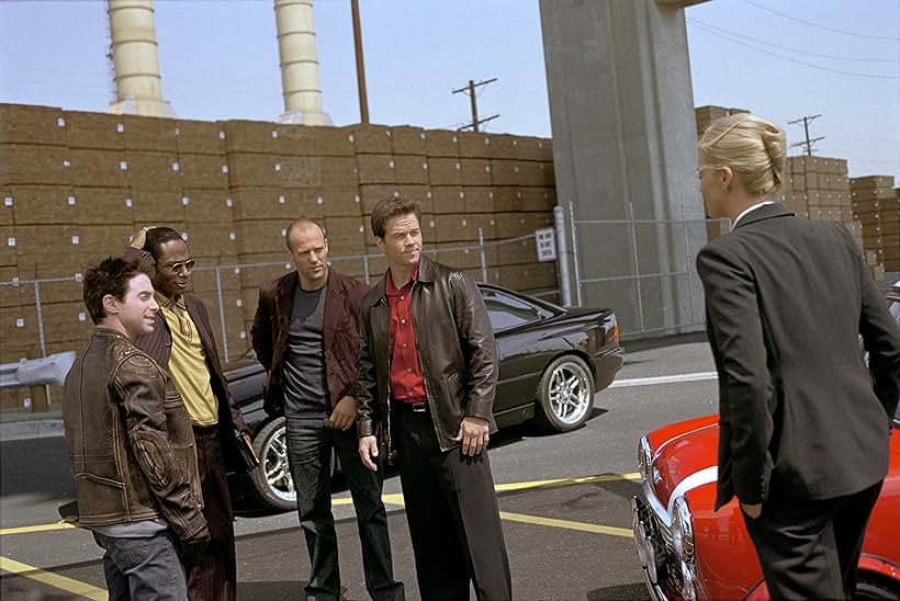 Charlize Theron, Mark Wahlberg, Seth Green, Jason Statham, and Yasiin Bey in The Italian Job (2003)