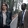 Don Cheadle and Emily Mortimer in Don't Look Deeper (2020)