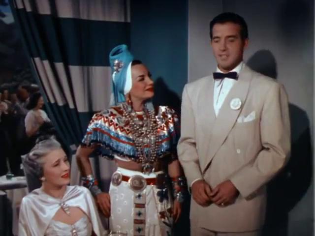 Carmen Miranda, Bess Flowers, and John Payne in Springtime in the Rockies (1942)