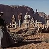 John Wayne, Ward Bond, Harry Carey Jr., Jeffrey Hunter, Olive Carey, Ken Curtis, and John Qualen in The Searchers (1956)