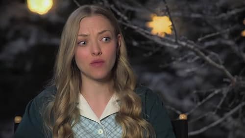 Love The Coopers: Amanda Seyfried On The Caroling Scene With The Family