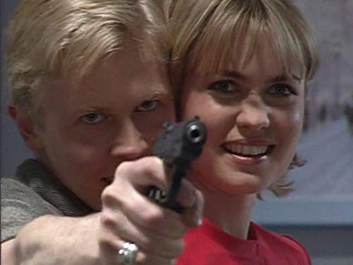 Radha Mitchell and Simon Wilton in Blue Heelers (1994)