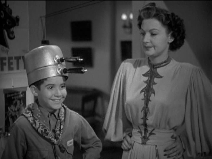 Scotty Beckett and Marta Linden in The Youngest Profession (1943)