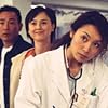 Kenix Kwok, Bowie Lam, and Belinda Hamnett in Chi yung san ging gai (2003)