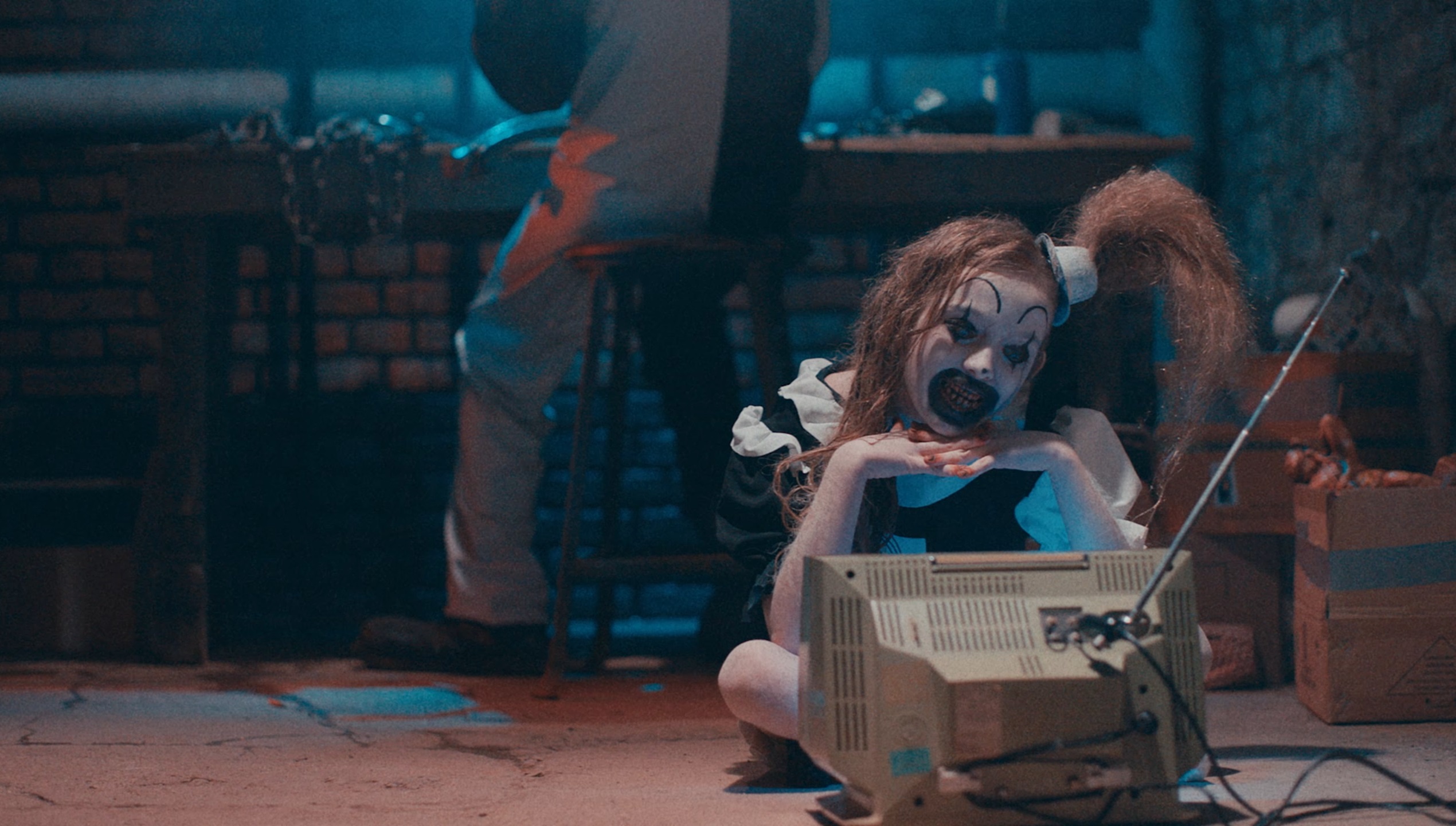 Amelie McLain and David Howard Thornton in Terrifier 2 (2022)