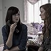 Wrenn Schmidt and Kate Lyn Sheil in Outcast (2016)