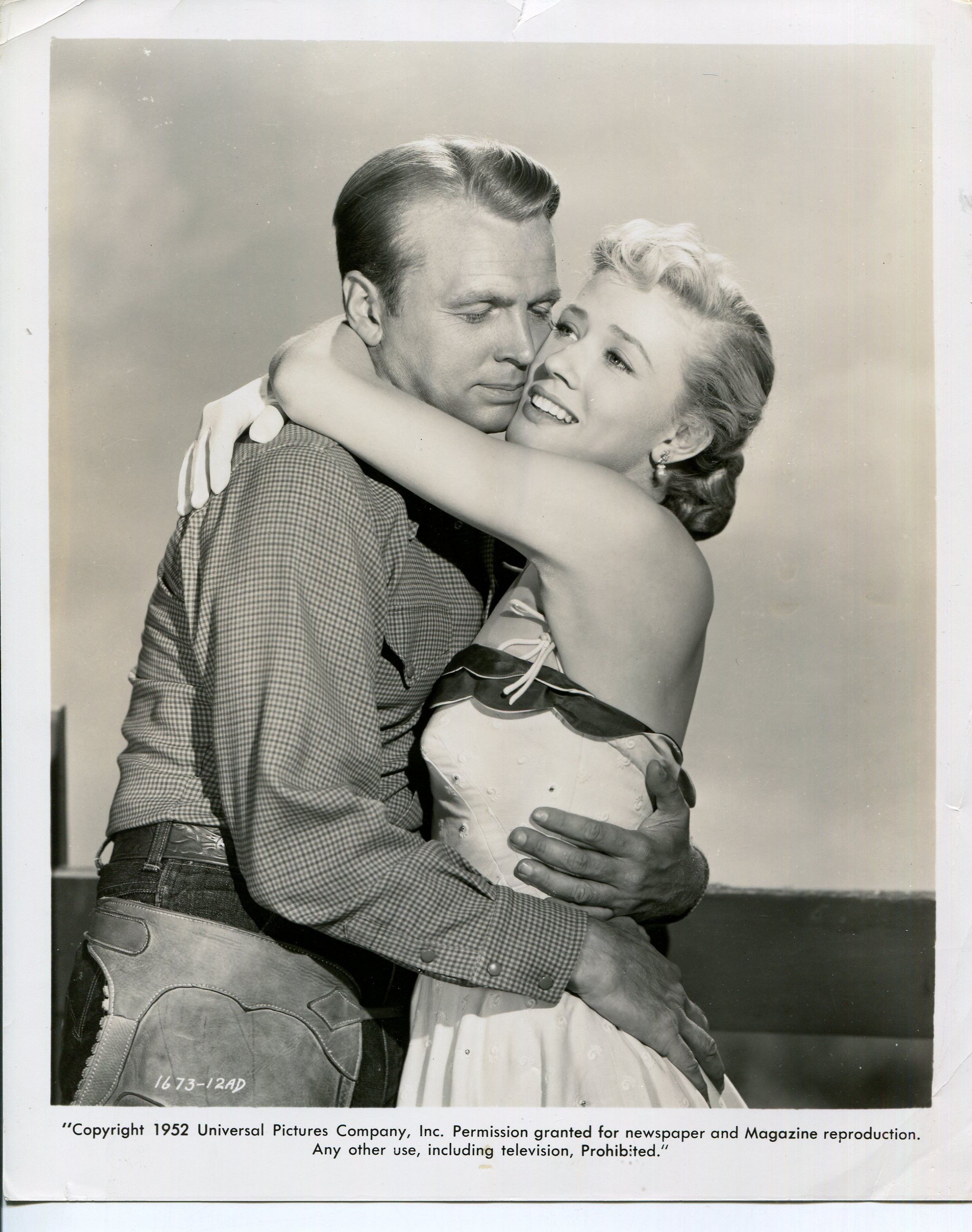 Joyce Holden and John Lund in Bronco Buster (1952)