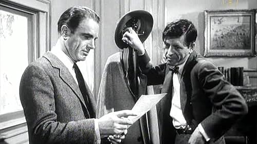 Charles Korvin and Edwin Richfield in Interpol Calling (1959)