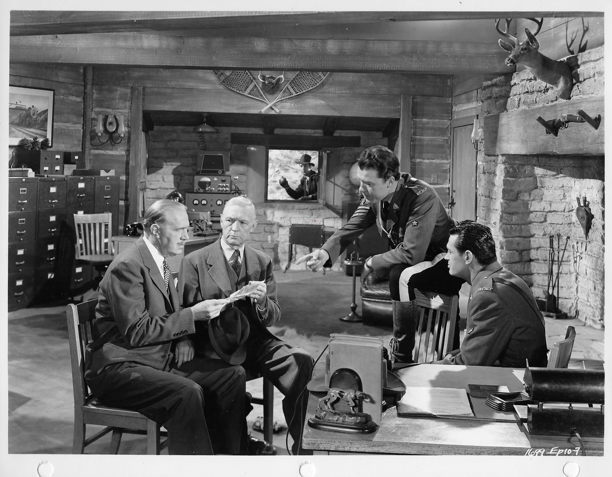 Jim Bannon, James Carlisle, Frank O'Connor, Anthony Warde, and Phil Warren in Dangers of the Canadian Mounted (1948)