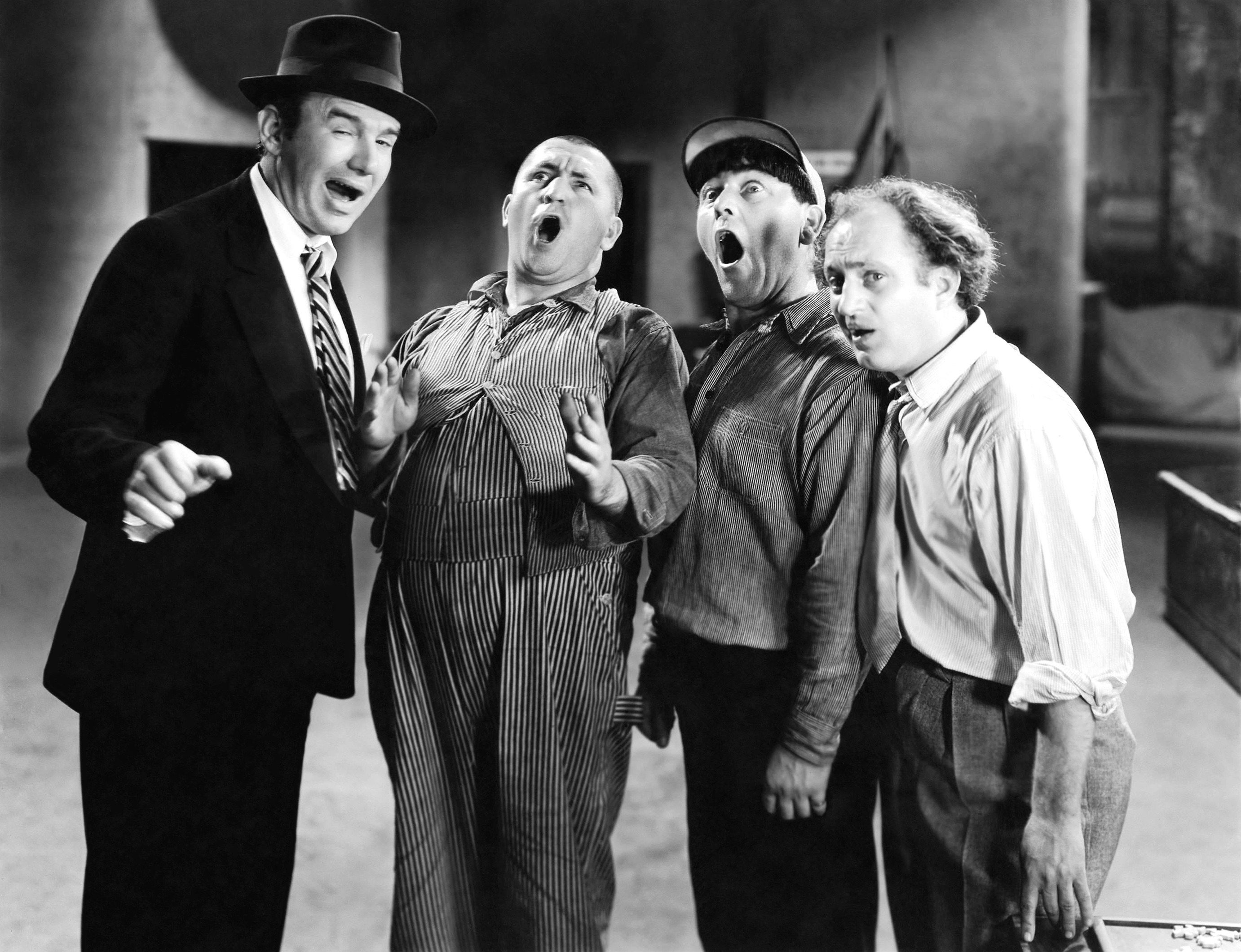 Moe Howard, Larry Fine, Ted Healy, and Curly Howard in Dancing Lady (1933)