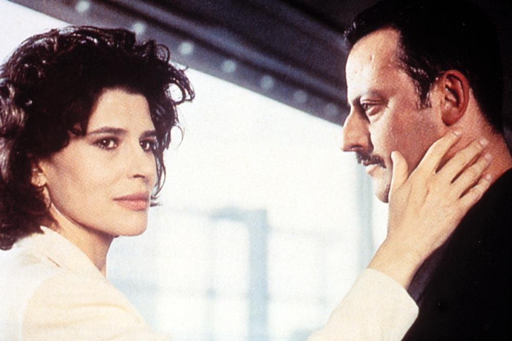 Fanny Ardant and Jean Reno in Beyond the Clouds (1995)