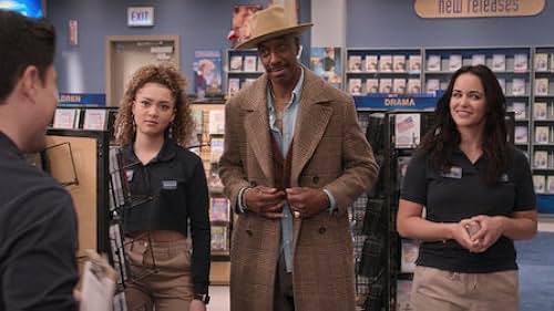 Melissa Fumero, J.B. Smoove, and Kamaia Fairburn in Blockbuster (2022)