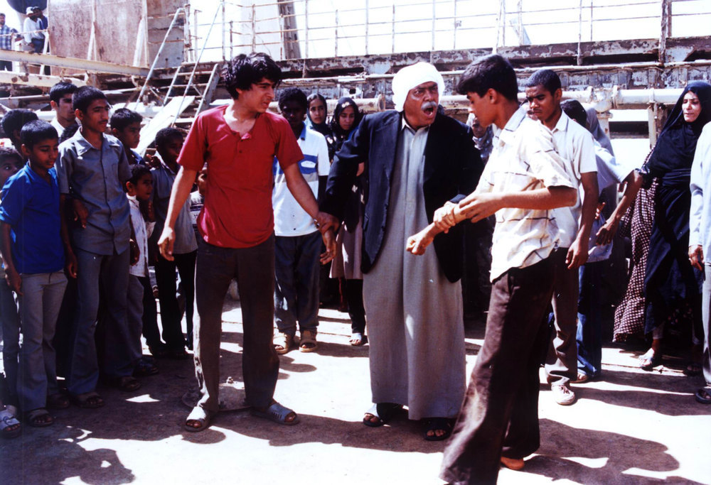 Ali Nasirian and Hossein Farzizade in Iron Island (2005)