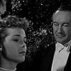 George Sanders and Nancy Gates in Death of a Scoundrel (1956)