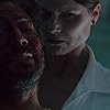 Henry Ian Cusick and Erika Ervin in Chimera Strain (2018)