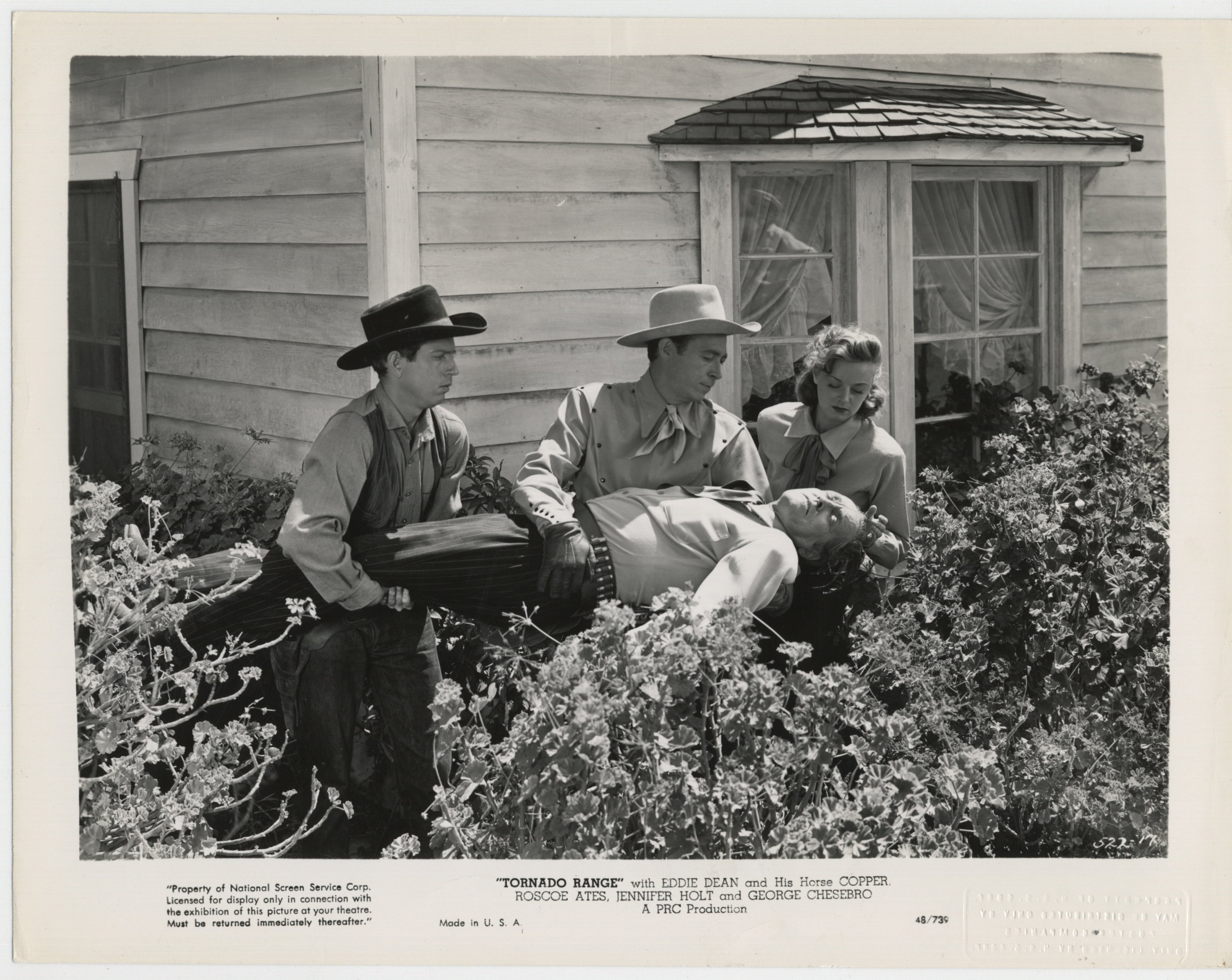 George Chesebro, Eddie Dean, Jennifer Holt, and Buster Slaven in Tornado Range (1948)